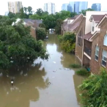 Flooded neighborhood street in the aftermath of Hurricane Harvey