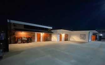 La Puente High School Pool, Kitchen, and Dressing Rooms building exterior at night